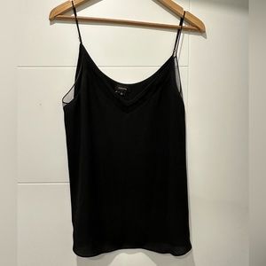 Babaton camisole tank tops with mesh detail.